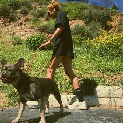 Picture of Phoenix Chi Gulzar and her dog Yoda. 